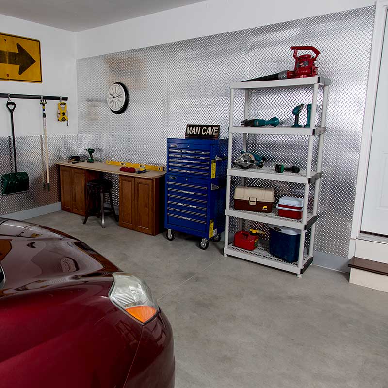 Garage with Fasade's Diamond Plate in Brushed Aluminum.